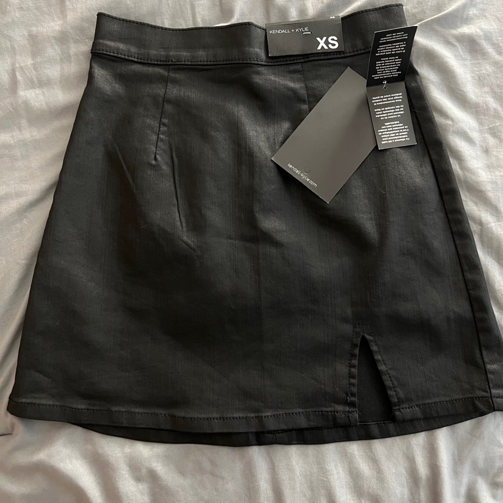 Kendall and Kylie coated black mini skirt